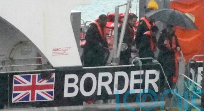 Embattled Home Secretary visits migrant facilities in bid to grip crisis
