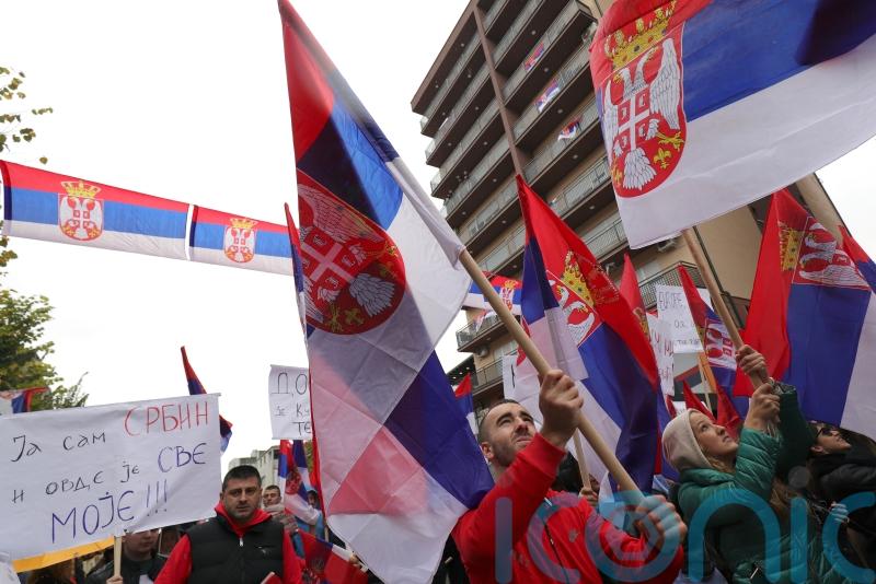Ethnic Serbs rally in Kosovo after leaving jobs in protest over number plates