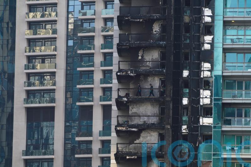 Fire in Dubai high-rise near world’s tallest building fuelled by cladding