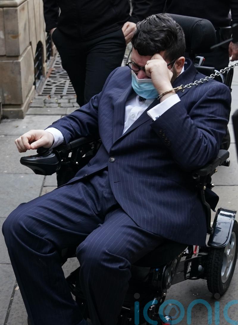 Man facing extradition claims he was given distinctive tattoos ‘while in coma’