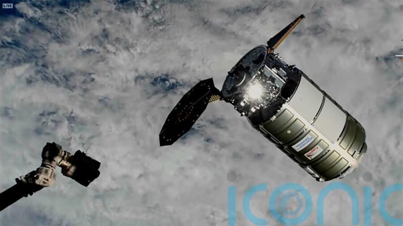 Cargo ship reaches space station despite jammed solar panel