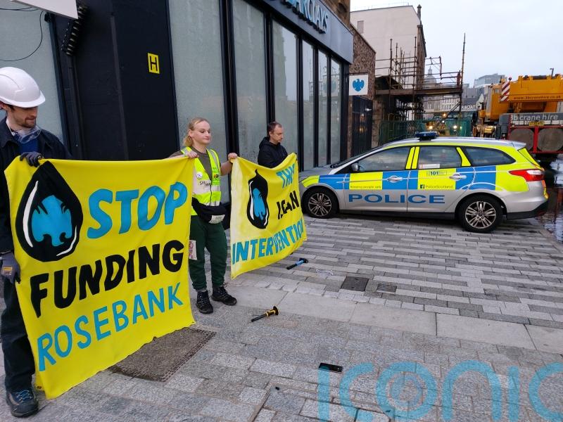 Two arrested after bank windows smashed in climate protest
