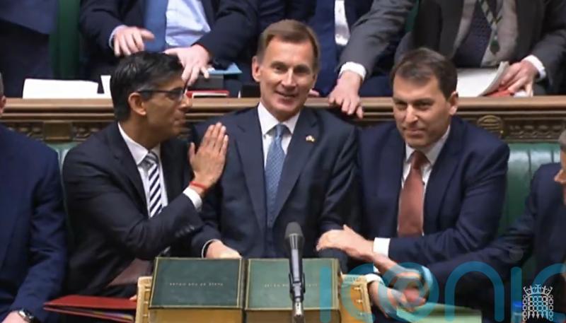 Hunt blames ‘recession made in Russia’ as he increases taxes and cuts spending