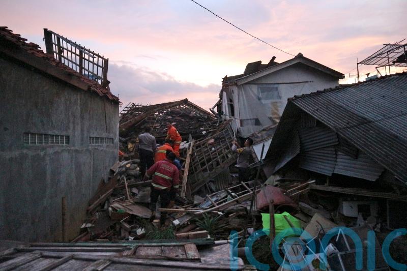Rescuers search through rubble after 268 killed in Java quake