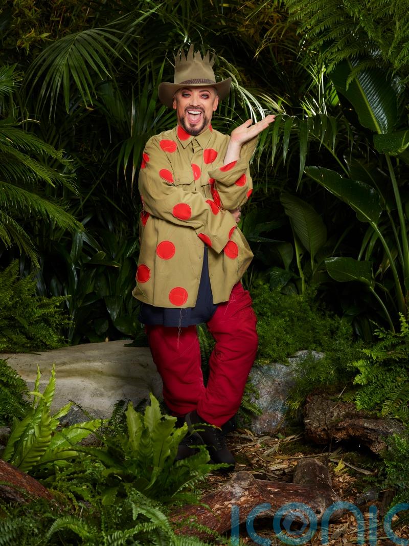 Boy George celebrates jungle exit with shower, pizza and World Cup replays