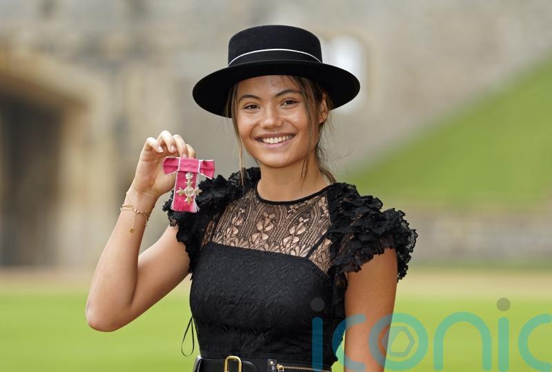 Emma Raducanu collects her MBE wearing Dior