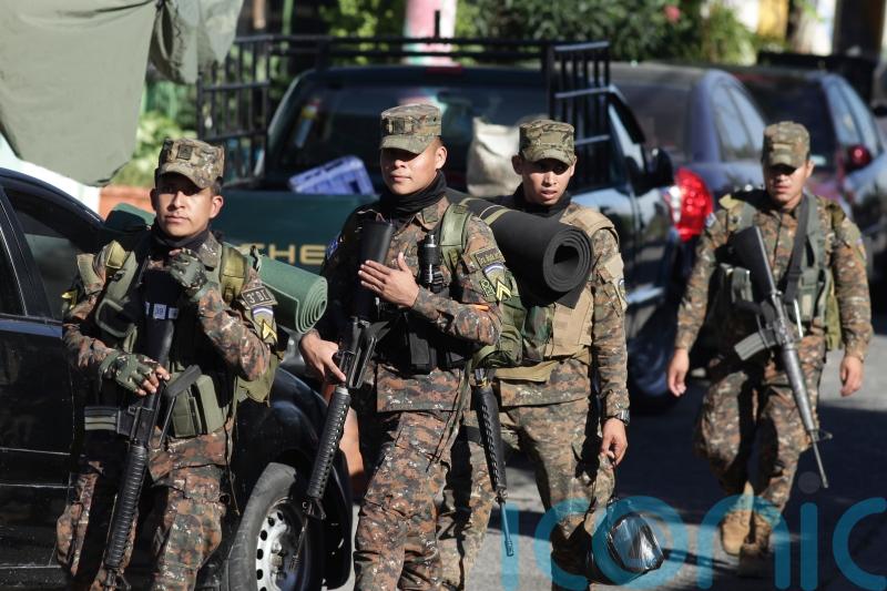 El Salvador seals off town as 10,000 police officers and soldiers hunt for gang