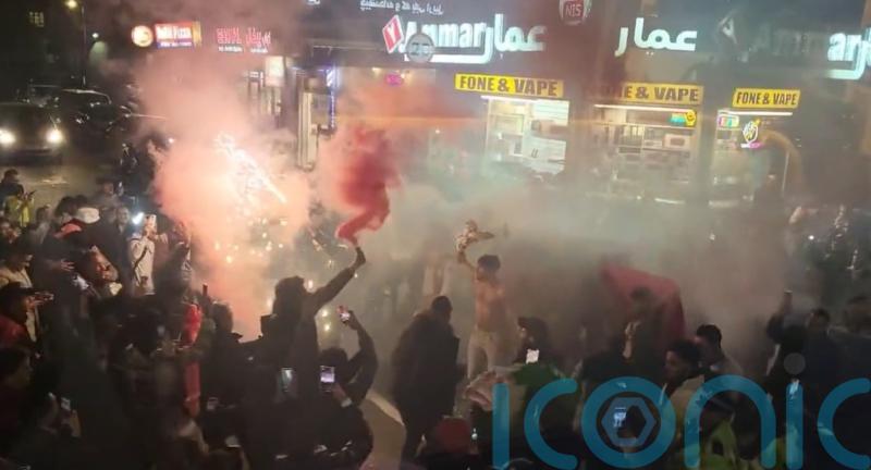 Morocco fans celebrate World Cup win with dancing and singing on London streets