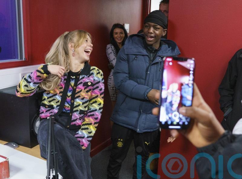 Pop star Becky Hill surprises youth club with charity single performance