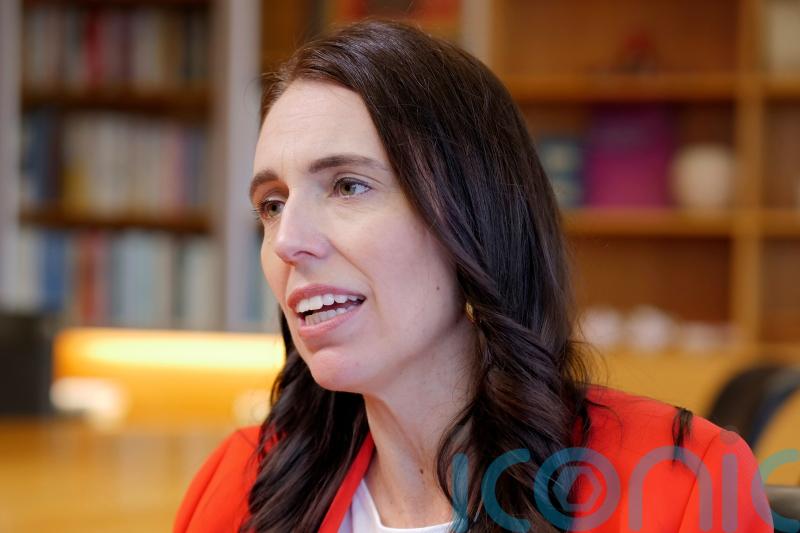 New Zealand’s leader says China has become ‘more assertive’