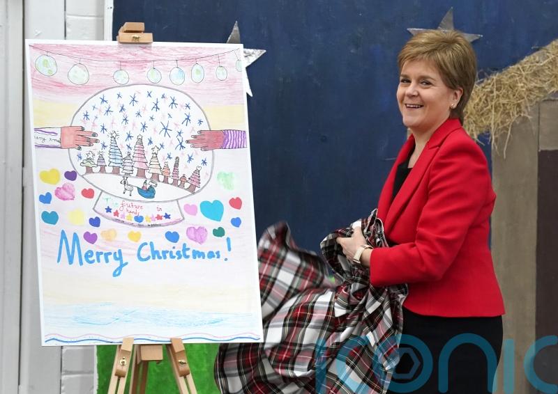 Nicola Sturgeon unveils her official Christmas card designed by school pupil