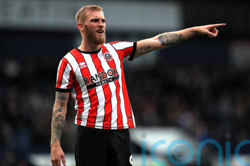 ‘Angry’ McBurnie came back out of tunnel before alleged stamp on fan, trial told