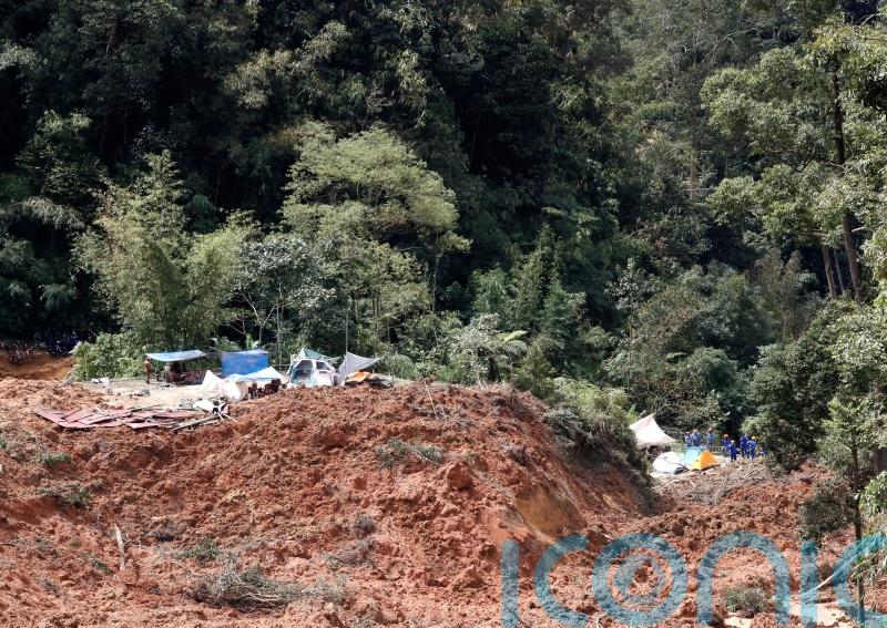 At least 21 die after landslide engulfs campsite in Malaysia