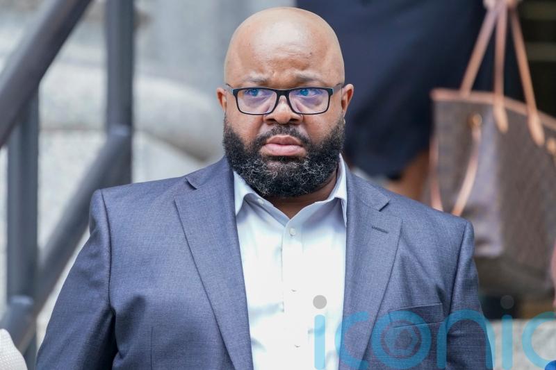 R. Kelly manager sentenced to a year in prison for theatre threat