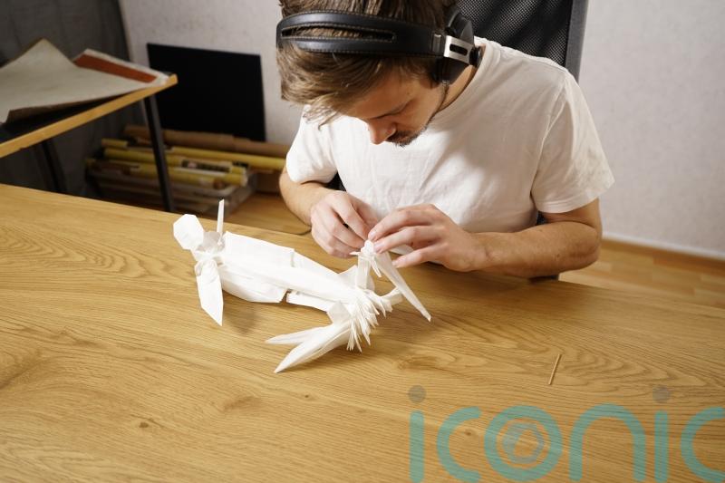 Uplifting stories of 2022: Hollywood star in supermarket and origami masterpiece