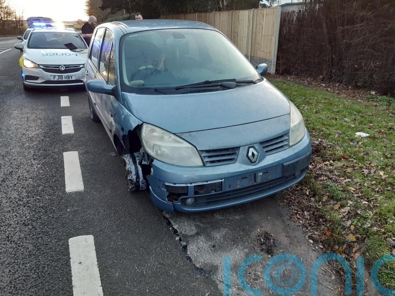 Man stopped by police after being caught driving car with missing wheel