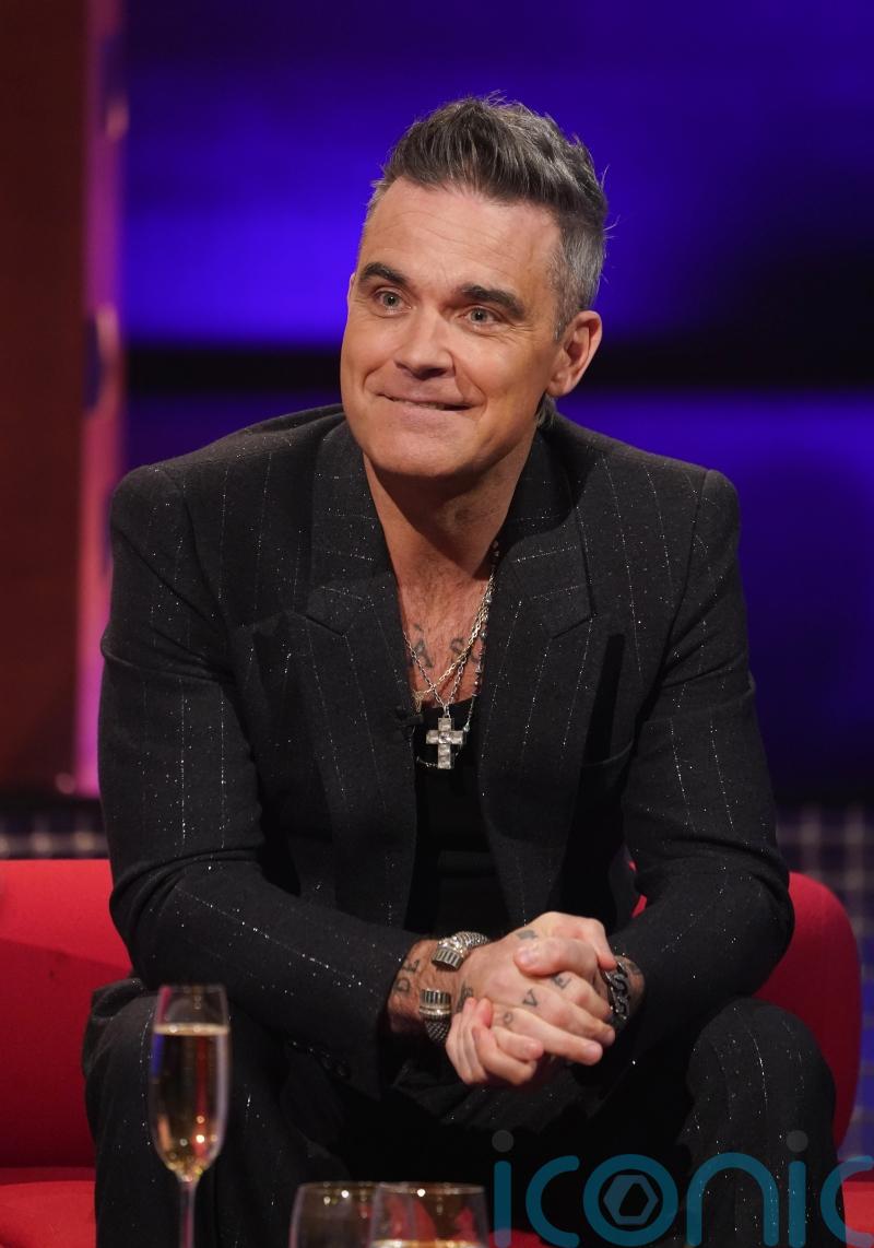 Robbie Williams reveals he sees himself in Harry Styles