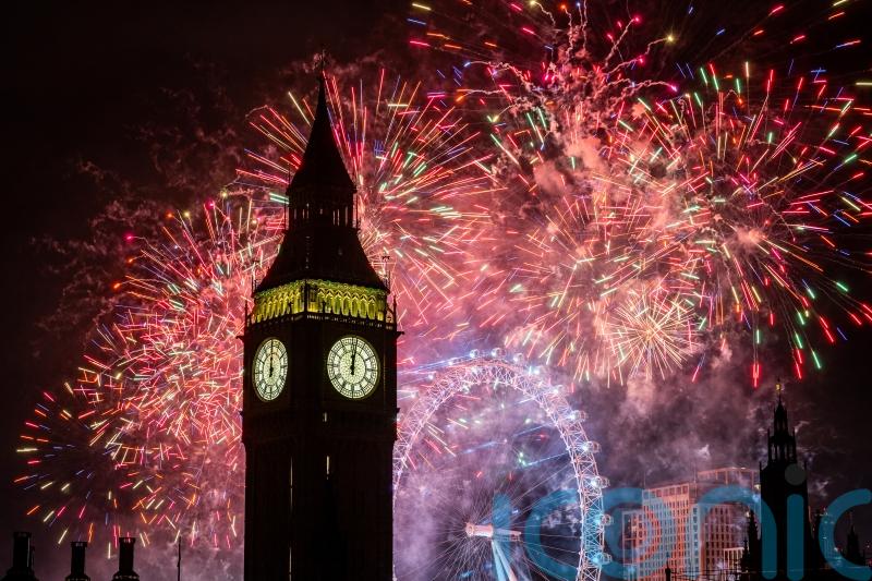 Revellers celebrate New Year&rsquo;s Eve across UK with fun and fireworks