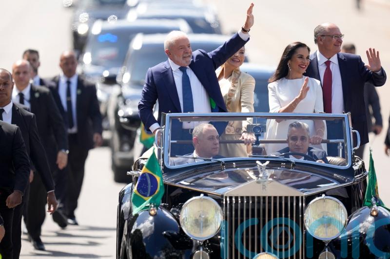 Lula vows accountability and rebuilding as new president of polarised Brazil