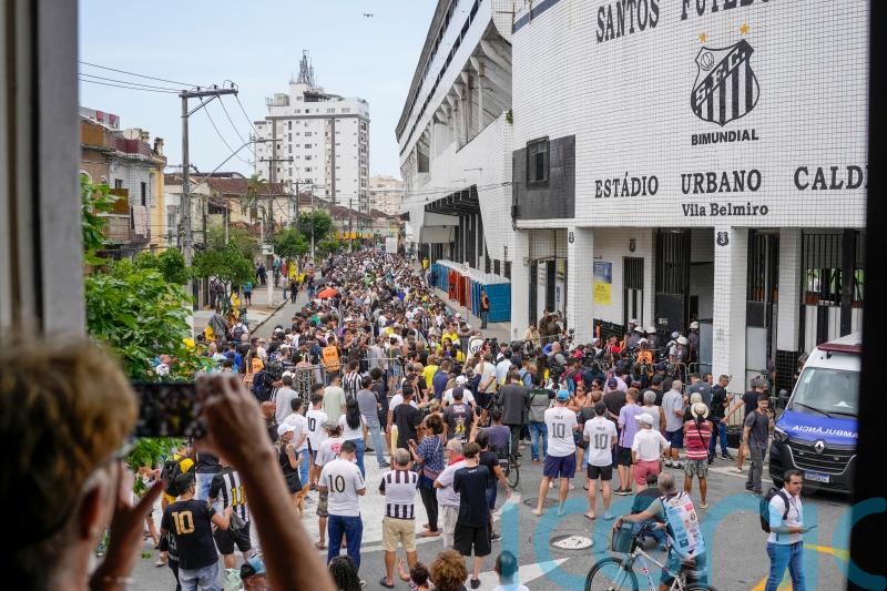 Fans line up at stadium to mourn Pele ahead of funeral