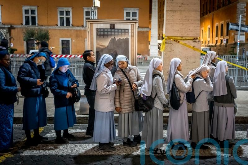 Pilgrims keep streaming to Vatican to honour Pope Benedict