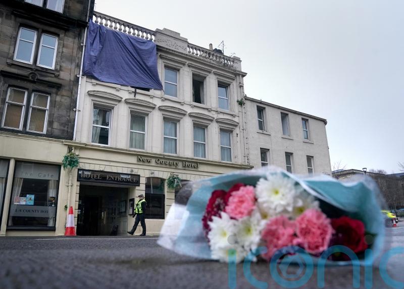Investigations continue after three killed in hotel blaze