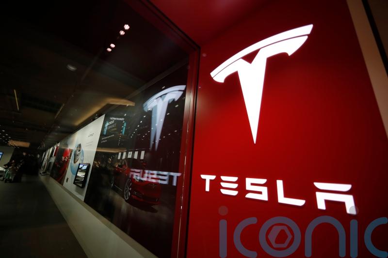 Tesla shares tumble after electric vehicle company misses delivery target