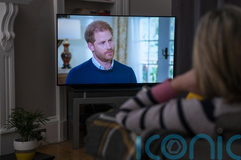 Harry denies accusing royals of racism as he criticises family in TV interview