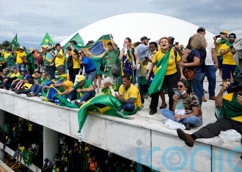 Brazilian authorities seek to punish pro-Bolsonaro rioters