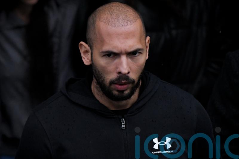Divisive influencer Andrew Tate appears in Romanian court