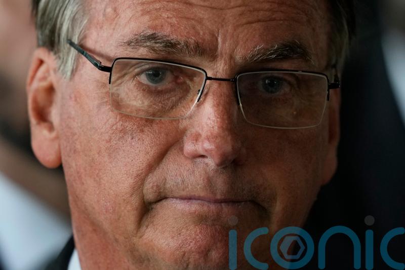 Bolsonaro eyes early return to Brazil as US stay pressures Biden