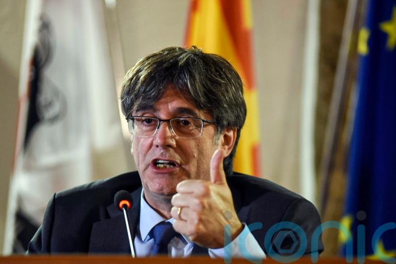 Spain drops sedition charge against former Catalan leader Carles Puigdemont