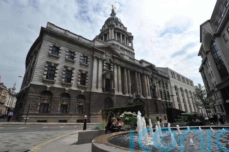 Drunken son killed father with full bottle of Champagne, court told