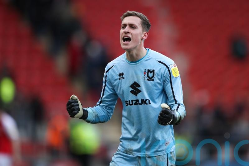 Jamie Cumming ‘quality’ kept MK Dons alive in Lincoln stalemate