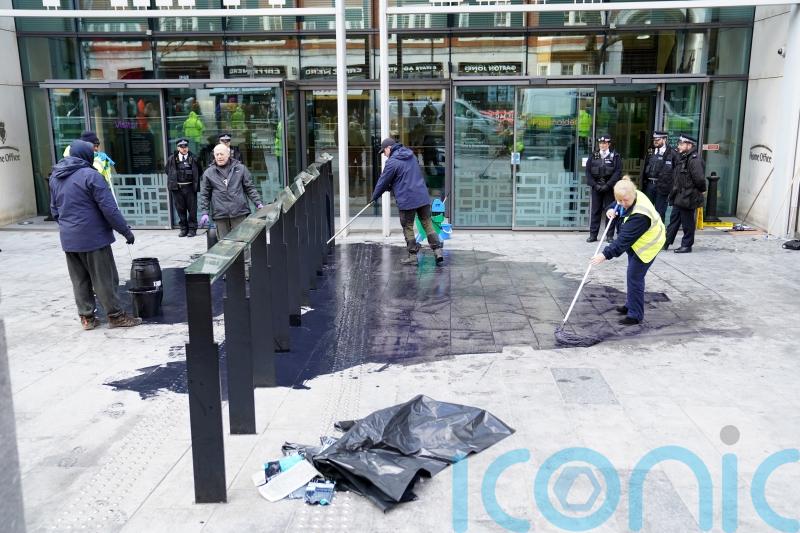 Extinction Rebellion throw black paint over Michael Gove’s office