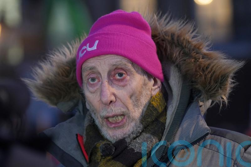 Poet Michael Rosen marches with nurses out of ‘gratitude’ after his Covid coma