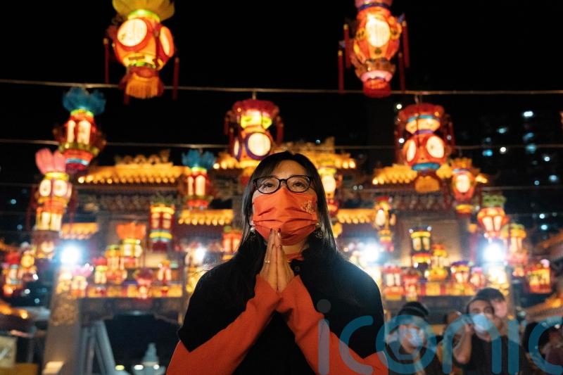 China rings in Lunar New Year with most Covid rules lifted