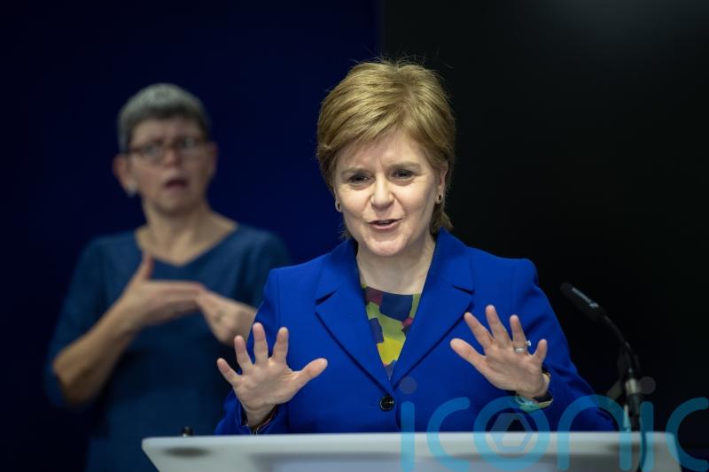 Sturgeon condemns placards at rally against blocking of gender reforms
