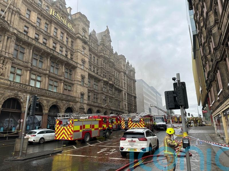 Firefighter in critical condition after blaze at former department store