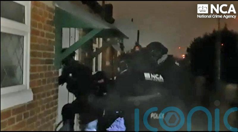 NCA raid suspected crime gang accused of exploiting migrants at cannabis farms