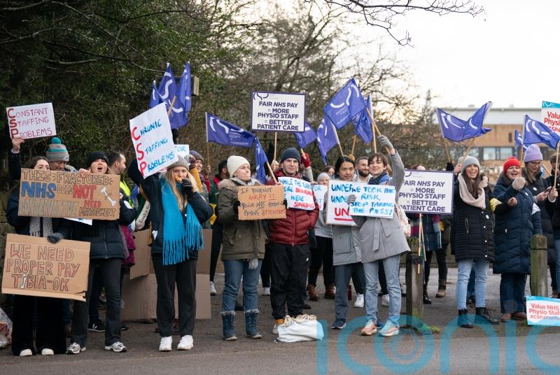 NHS physiotherapists say staff are ‘beyond breaking point’ in historic strike