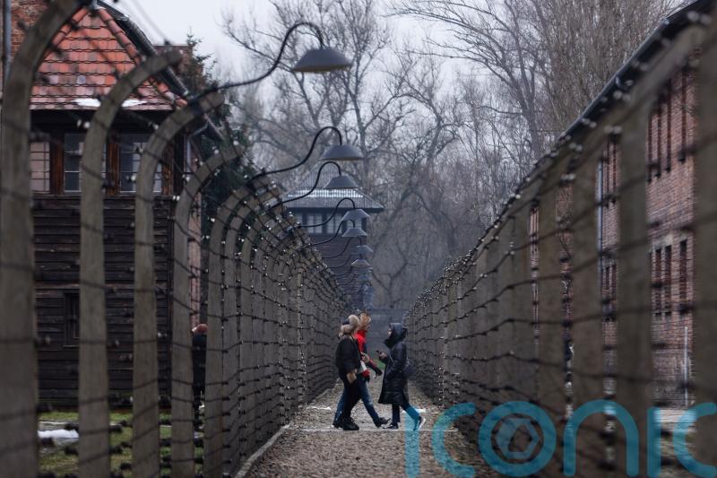 Auschwitz anniversary marked as peace in Europe again shattered by war