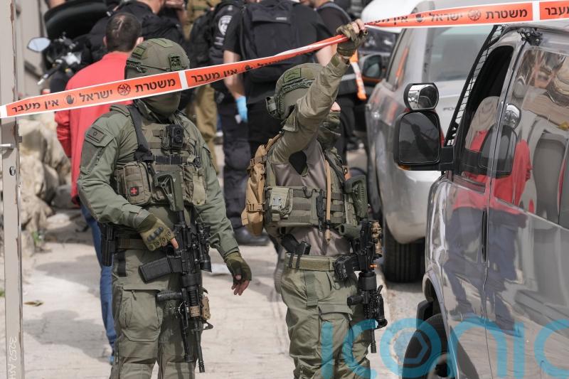 Two Israelis injured after teenager opens fire in east Jerusalem