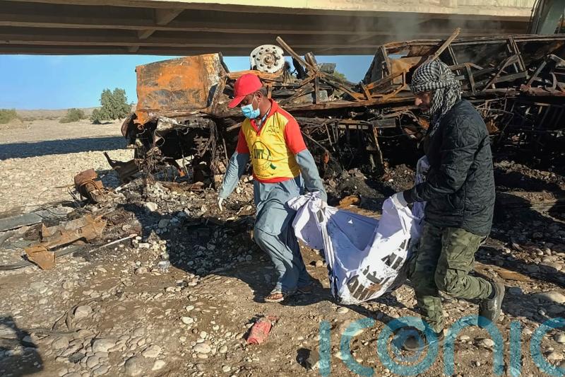 40 dead after bus crashes and catches fire in Pakistan