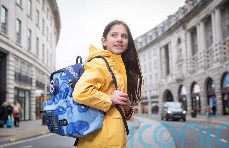 Girl inspired by asthmatic mother to create air filter backpack wins competition