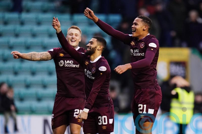 Hearts hit back to beat 10-man Dundee United