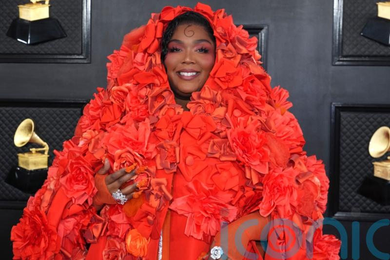 Lizzo dazzles with Dolce and Gabbana dress on Grammys red carpet
