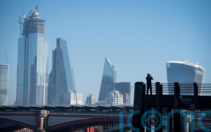 FTSE 100 rises to new record high as market improves and recession fears calm