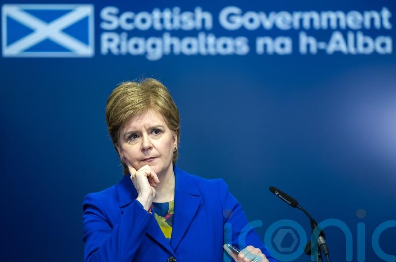 First Minister urged to admit council budgets face being cut next year
