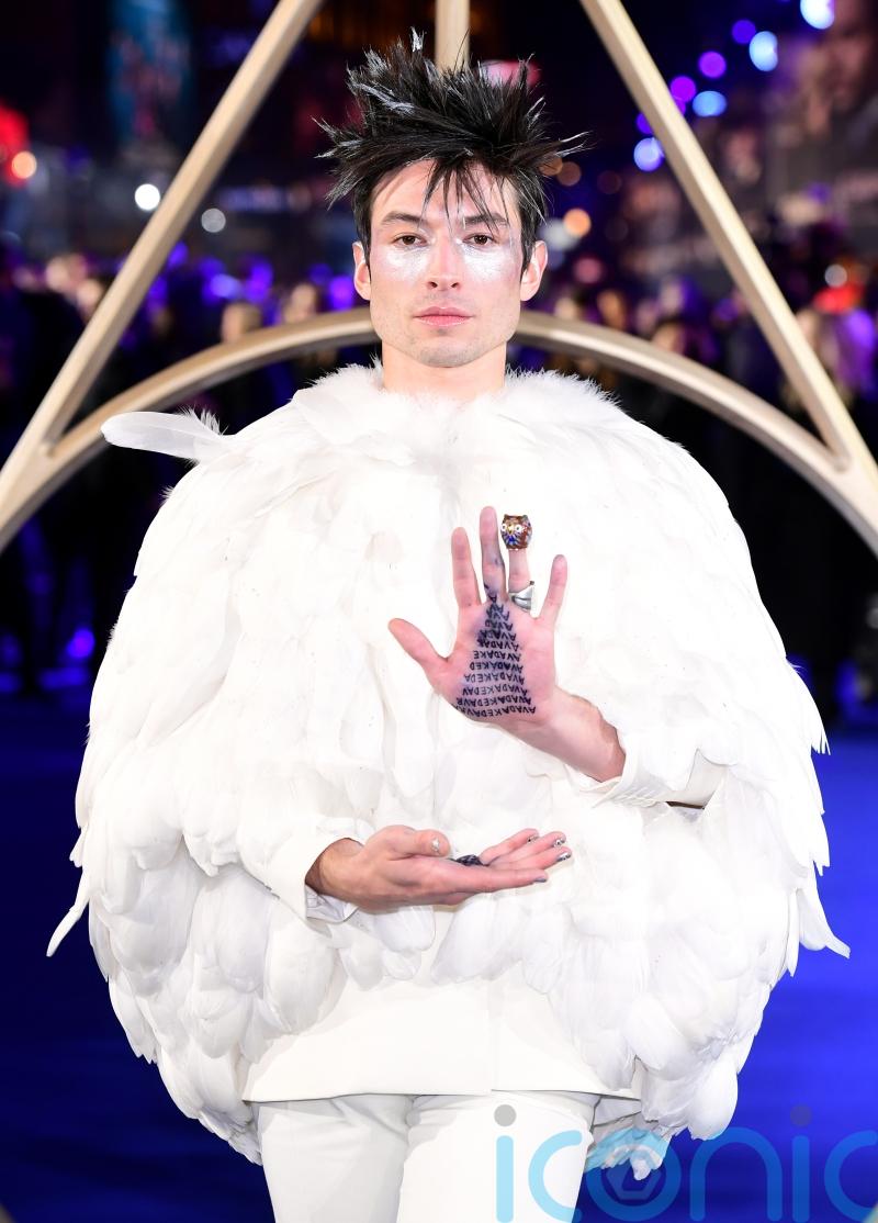 Ezra Miller teams up with two Batmans in The Flash Super Bowl trailer
